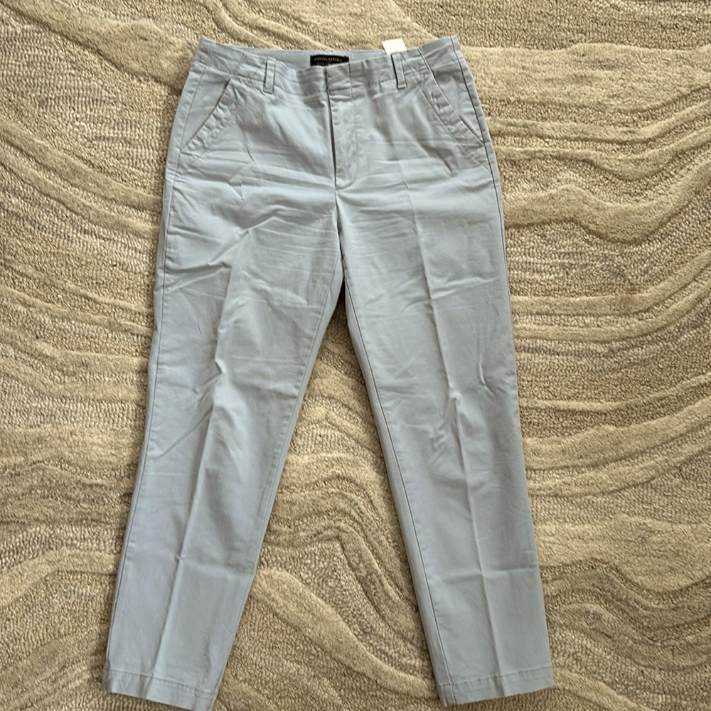Banana Republic khaki pants. I am 5’4” and they hit at the ankle. Worn twice.